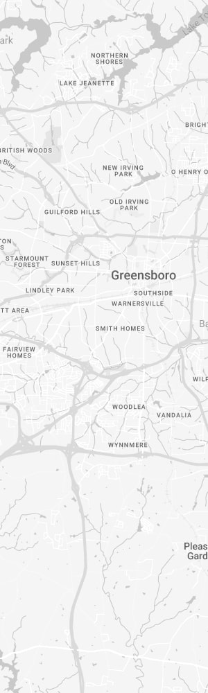 Our Greensboro SEO Company with a grey scale map of Greensboro, NC