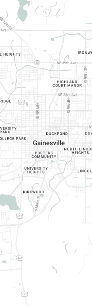 Our Gainesville SEO Company with a grey scale map of Gainesville, FL